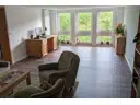 Wohnzimmer der Obergeschoss-Wohnung