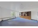 EG Wohnzimmer mit Zugang zum Balkon