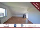 Wohnzimmer mit Kaminofen