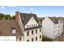 Hausansicht; 3-Zimmer-Wohnung mit Garten zum Kauf in Eller