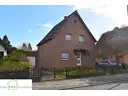Hausansicht Vorderseite, Grundstück mit Altebstand zum Kauf in Düsseldorf Urdenbach Frank Ewe Immobilienmakler