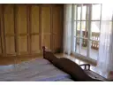 Schlafzimmer mit Balkon