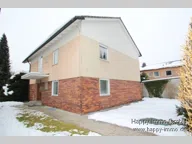 Titelbild für Das Einfamilienhaus liegt in einer ruhigen Anwohnerstraße in Grünwald und