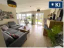 Wohnzimmer mit offener Wohnküche