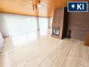 Wohnzimmer mit Zugang Terrasse