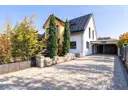 Einfahrt mit Carport