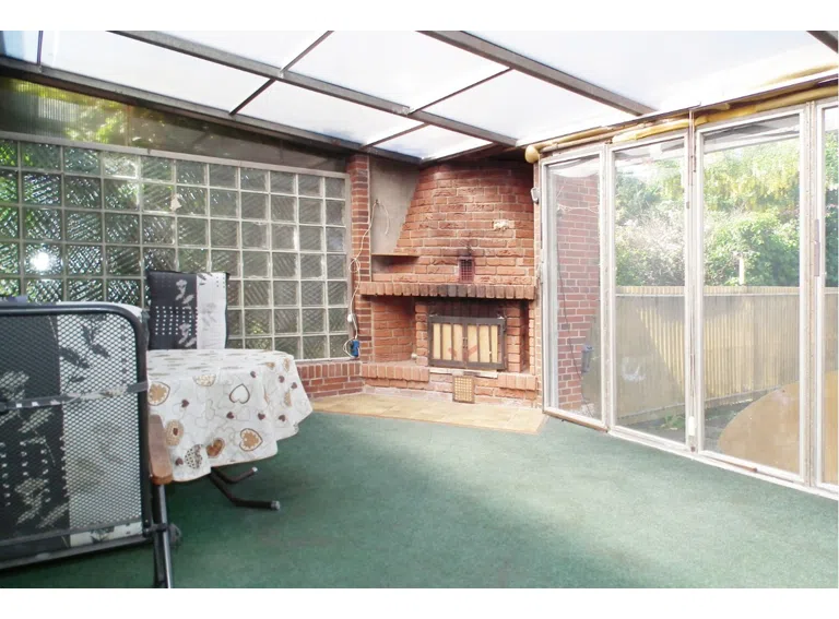 Wintergarten mit Kamin