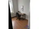 Zimmer 2 - KI - Lütt Immobilien.png