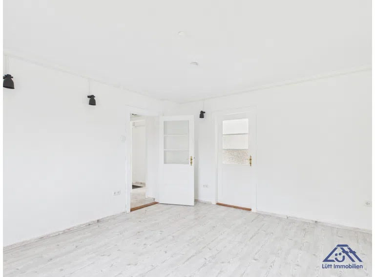 Wohnzimmer Eingang - Lütt Immobilien - Kiel