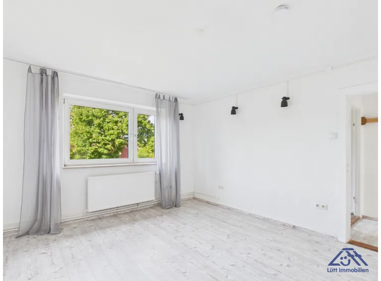 Wohnzimmer - Lütt Immobilien - Kiel