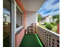 Südbalkon von der Wohnzimmertür aus gesehen. Links eins von zwei Schlafzimmern