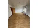3 Wohnzimmer mit Balkonzugang