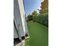 15 Garten und Spielbereich an Giebelseite