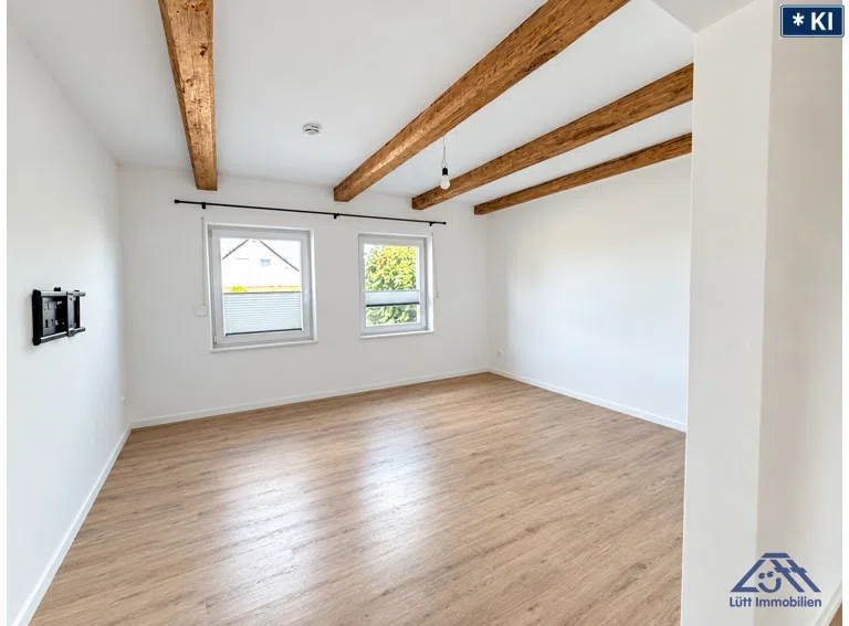 Wohnzimmer - Lütt Immobilien Malente