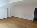 Schlafzimmer mit Zugang zum Bad