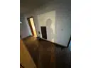 24 Flur mit Kaminofen