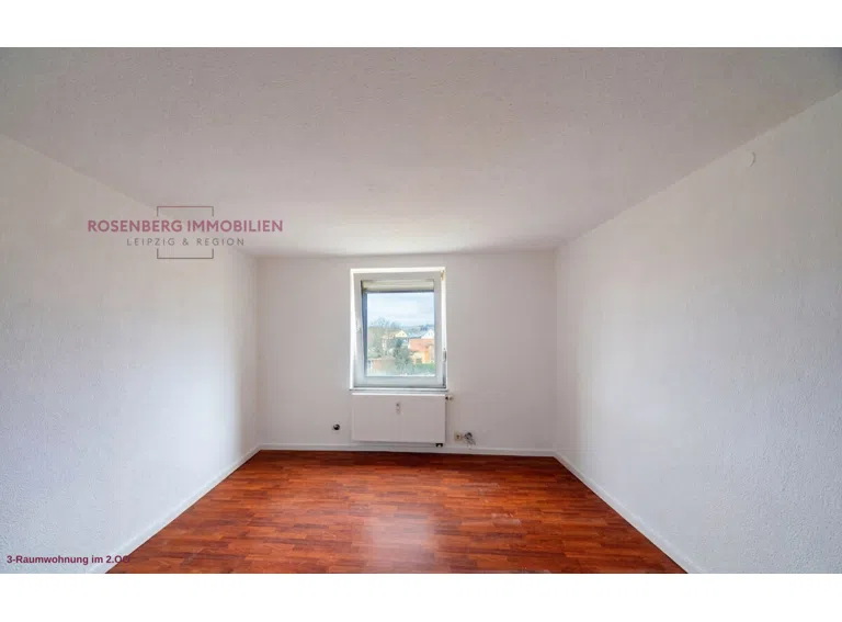 bacd933d-wohnzimmer-mehrfamilienhaus-in-muegeln-crellenhain.jpg