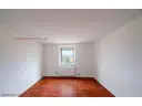 bacd933d-wohnzimmer-mehrfamilienhaus-in-muegeln-crellenhain.jpg