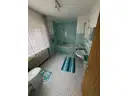 15 Bad mit Wnne und Duschmöglichkeit Doppelwaschbecken und WC
