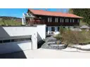 Außenansicht Garage und Wohnhaus