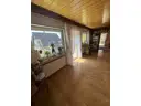 13 Wohnzim,mer mit Balkonzugang