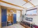 Großer Abstellraum mit Durchgang zur Garage EG - Lütt Immobilien - Schackendorf