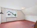 Zimmer 3 Dachgeschoss Ansicht - Lütt Immobilien - Schackendorf