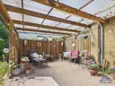 Überdachte Terrasse Ansicht 1 - Lütt Immobilien - Schackendorf