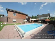 Titelbild für Dieses hochwertige, facettenreiche, freistehende Einfamilienhaus wurde 1990 in Massivbauweise errichtet