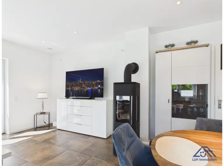 Wohnzimmer EG Kaminofen - Lütt Immobilien Selent