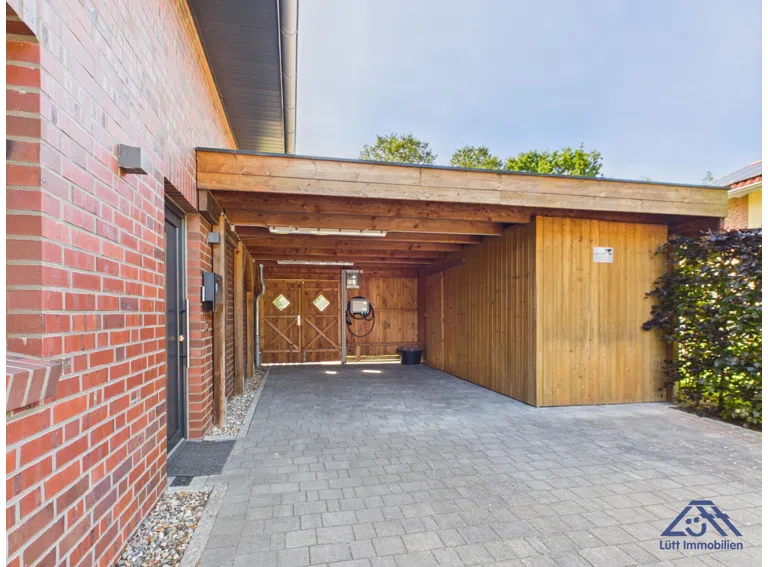 Carport mit Abstellraum - Lütt Immobilien Selent