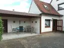 Rückansicht mit überdachtemFreisitz