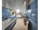 Tageslicht-Bad mit Badewanne im Obergeschoss