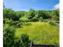 Blick vom rückwärtigen Balkon in den Garten