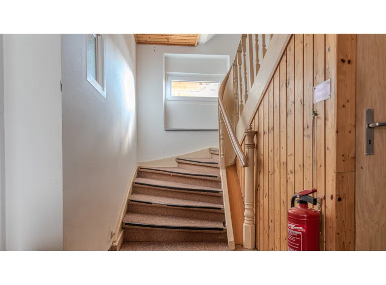 Treppe ins Obergeschoss