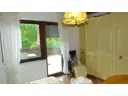 Schlafzimmer mit Balkontür