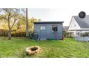 RF-1384 Winkelhaid Gartenhaus mit Feuerstelle