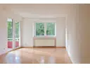 Wohnzimmer mit Balkon